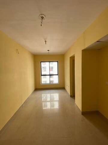 Living Room in 1 BHK Apartment at Lodha Crown Quality Homes Dombivli, Dombivli East – for Rent
