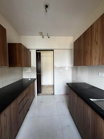 Kitchen in 3 BHK Apartment at Lodha Splendora, Ghodbunder Road – for Sale