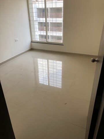 Room in 2 BHK Apartment at Mantra 29 Gold Coast, Tingre Nagar – for Sale
