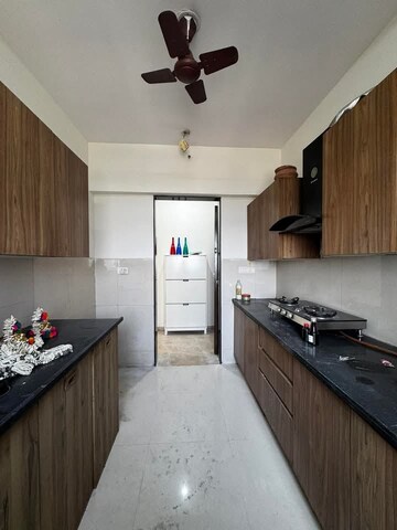 Kitchen in 3 BHK Apartment at Lodha Splendora, Ghodbunder Road – for Rent