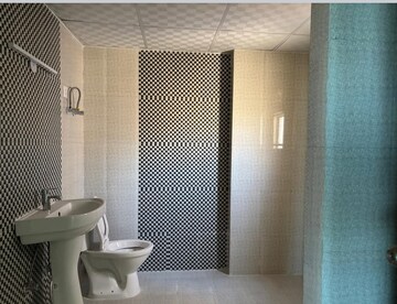 Bathroom in 3.5 BHK Apartment at JKG Palm Court, Sector 16c Greater Noida – for Rent