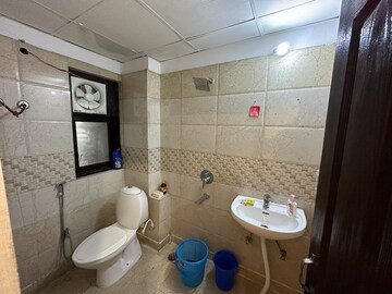 Bathroom in 2 BHK Apartment at Windsor Paradise 2, Raj Nagar Extension – for Rent