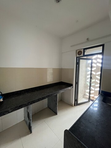 Kitchen in 1 BHK Apartment at Lodha Palava Downtown, Dombivli East – for Rent