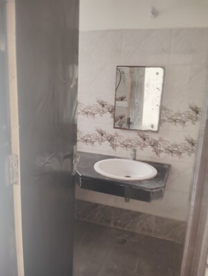 Bathroom in 3 BHK Builder Floor at Krish Aura, Alwar Bypass Road – for Sale