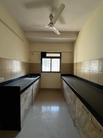 Kitchen in 3 BHK Apartment at Lodha Splendora Tierra, Ghodbunder Road – for Rent