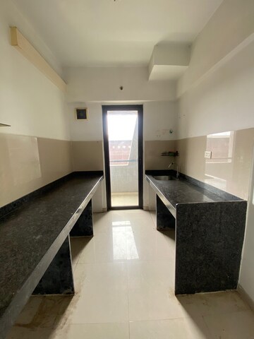 Kitchen in 1.5 BHK Apartment at Lodha Palava City Lakeshore Greens, Dombivli East – for Rent