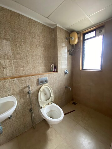 Bathroom in 1.5 BHK Apartment at Lodha Palava City Lakeshore Greens, Dombivli East – for Rent