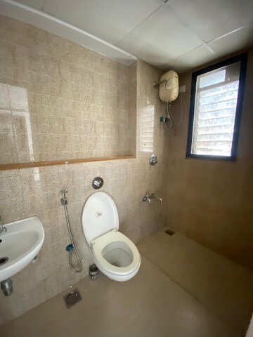 Bathroom in 1.5 BHK Apartment at Lodha Palava Downtown, Dombivli East – for Rent