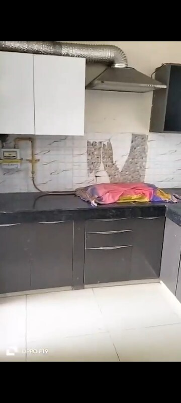 Kitchen in 2 BHK Apartment at Charms Castle Phase II, Raj Nagar Extension – for Rent