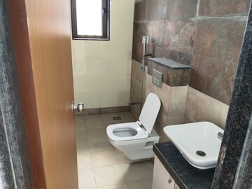 Bathroom in 3 BHK Apartment at Naman Habitat, Andheri West – for Rent