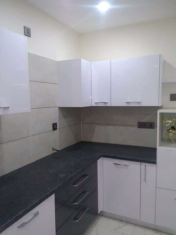 Kitchen in 3.5 BHK Apartment at Paradigm Business Hermitage Park, Dhakoli Village – for Sale