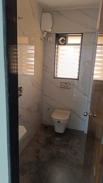 Bathroom in 3 BHK Apartment at Nav Indraprastha CHS, Mulund East – for Rent
