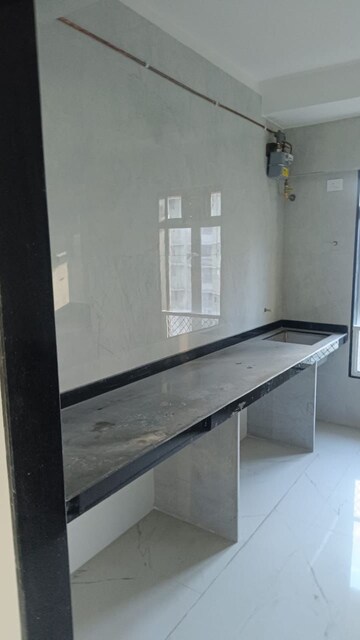 Kitchen in 3 BHK Apartment at Nav Indraprastha CHS, Mulund East – for Rent