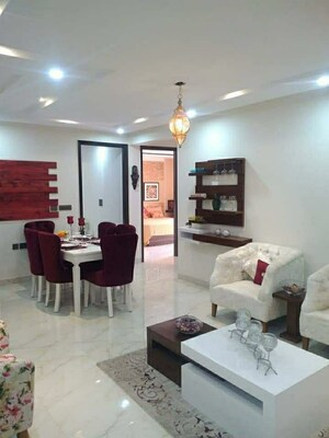 Living Room in 3.5 BHK Apartment at Paradigm Business Hermitage Park, Dhakoli Village – for Sale