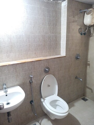 Bathroom in 1.5 BHK Apartment at Lodha Palava City Lakeshore Greens, Dombivli East – for Rent