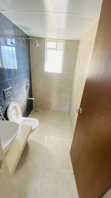 Bathroom in 1.5 BHK Apartment at Dosti West County, Balkum Pada – for Rent