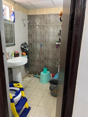 Bathroom in 2 BHK Apartment at Nilaya Greens, Raj Nagar Extension – for Sale