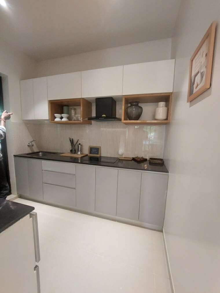 Kitchen, shapoorji-pallonji-joyville-hadapsar-annexe 2 Bedroom 669 Sq.Ft. Apartment In Hadapsar Pune 8448216