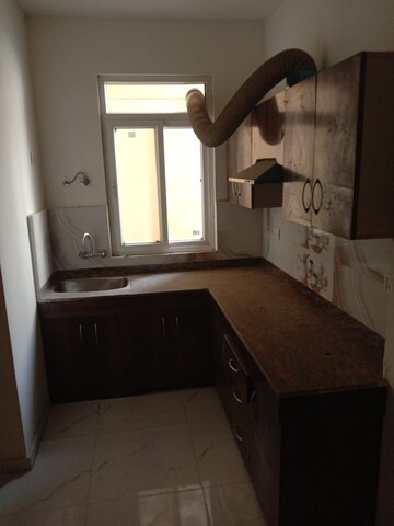 Kitchen in 2 BHK Apartment at Pivotal Devaan, Sector 84 – for Sale