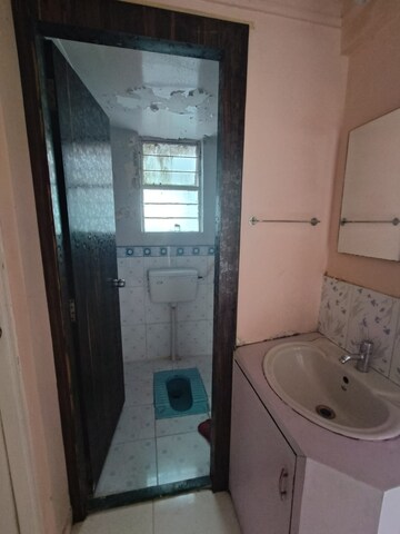 Bathroom in 2 BHK Apartment at Wadgaon Sheri – for Rent