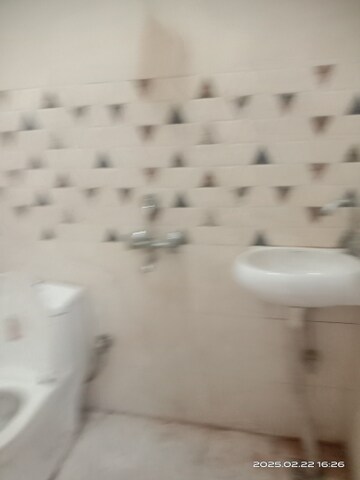 Bathroom in 2 BHK Builder Floor at Patel Nagar Society, Sector 15 – for Rent
