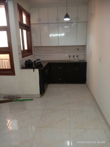 Kitchen in 2 BHK Builder Floor at Patel Nagar Society, Sector 15 – for Rent