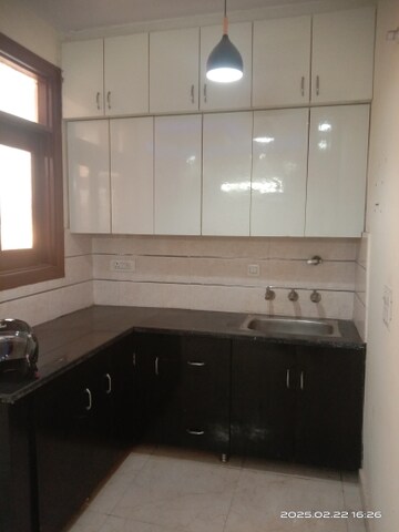 Kitchen in 2 BHK Builder Floor at Patel Nagar Society, Sector 15 – for Rent