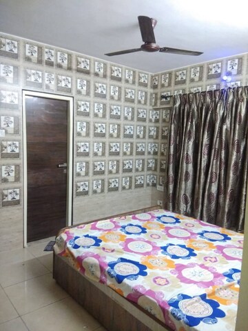 Bedroom in 2 BHK Apartment at Maharaja Retreat CHS, Goregaon East – for Rent