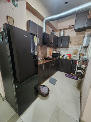 Kitchen in 2 BHK Apartment at Supertech Livingston, Sain Vihar – for Rent