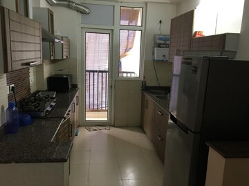 Kitchen in 3 BHK Apartment at Amrapali Platinum, Sector 119 – for Sale