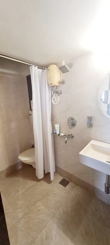 Bathroom in 3 BHK Apartment at Nav Indraprastha CHS, Mulund East – for Rent