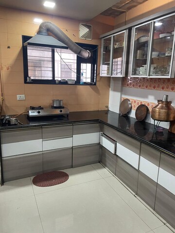 Kitchen in 3 BHK Apartment at Chintamani Apartments, Karve Nagar – for Sale