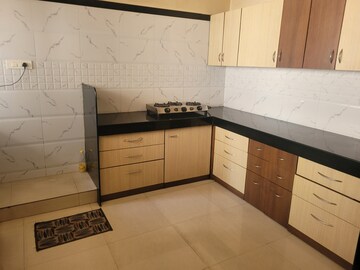 Kitchen in 2 BHK Apartment at Kumar Vastu, Bhosle Nagar – for Rent