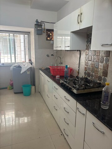 Kitchen in 2 BHK Apartment at Chuchum CHS, Santacruz West – for Rent