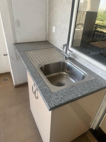 Kitchen in 2 BHK Apartment at Raheja Vedas, Sector 108 – for Rent