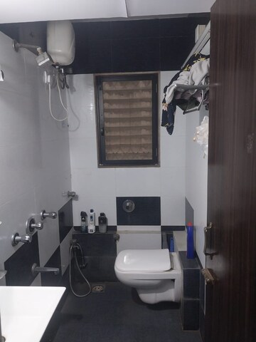 Bathroom in 2 BHK Apartment at Palash Towers, Andheri West – for Rent