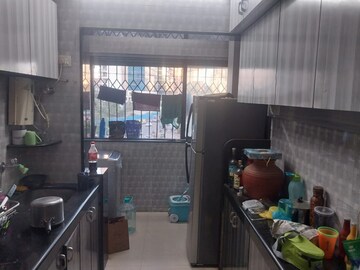 Kitchen in 2 BHK Apartment at Palash Towers, Andheri West – for Rent
