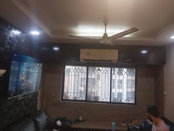 Living Room in 2 BHK Apartment at Palash Towers, Andheri West – for Rent