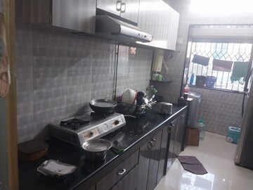 Kitchen in 2 BHK Apartment at Palash Towers, Andheri West – for Rent