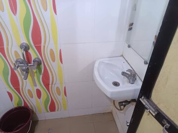 Bathroom in 1 BHK Apartment at Kopar Khairane Sector 20 – for Rent