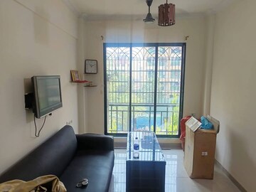 Living Room in 1 BHK Apartment at Kopar Khairane Sector 20 – for Rent