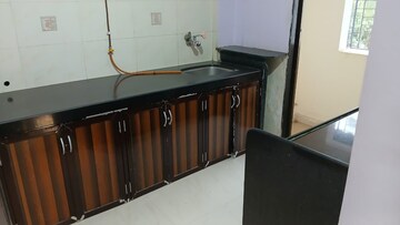 Kitchen in 2 BHK Apartment at Green Fields Apartment, Andheri East – for Rent