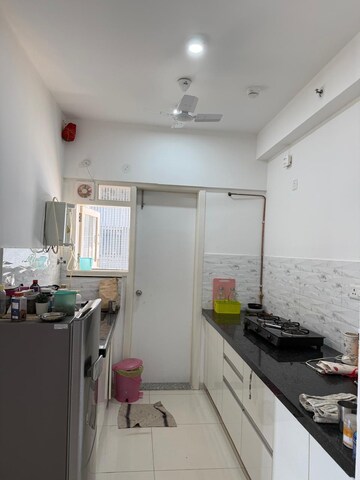 Kitchen in 2 BHK Apartment at Amanora Gold Towers, Hadapsar – for Rent