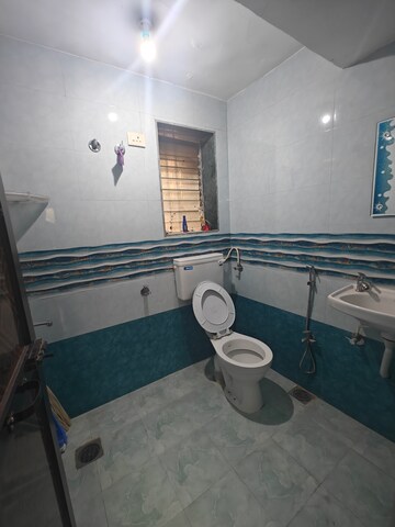 Bathroom in 2 BHK Apartment at Kendriya Vihar Seawoods, Seawoods West – for Rent