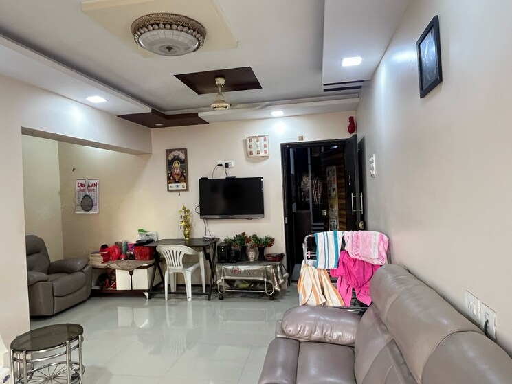 Living Room, unique-the-skyline 3 Bedroom 950 Sq.Ft. Apartment In Gokul Village Thane 8449171