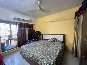 Bedroom in 3 BHK Apartment at Unique The Skyline, Gokul Village – for Sale