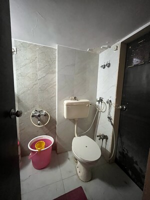 Bathroom in 3 BHK Apartment at Unique The Skyline, Gokul Village – for Sale