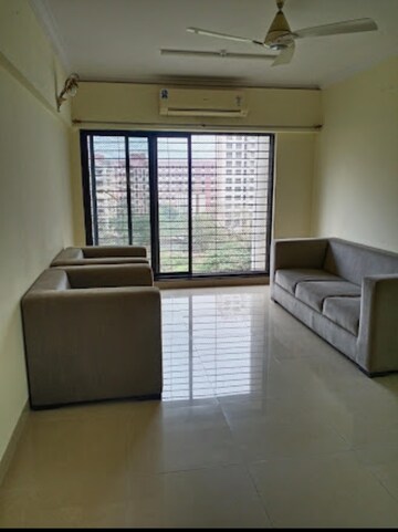 Living Room in 2 BHK Apartment at Raheja Tipco Heights, Malad East – for Rent