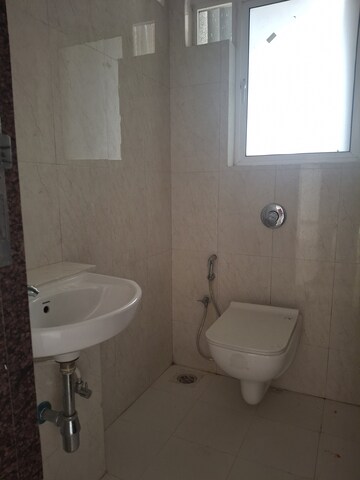 Bathroom in 1 BHK Apartment at Puranik Hometown, Ghodbunder Road – for Rent