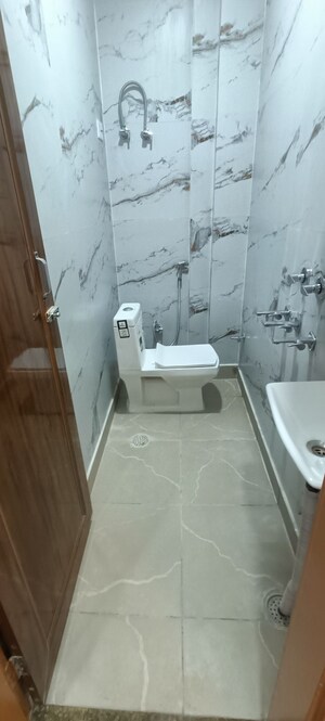 Bathroom in 2 BHK Builder Floor at Dwarka Mor – for Sale